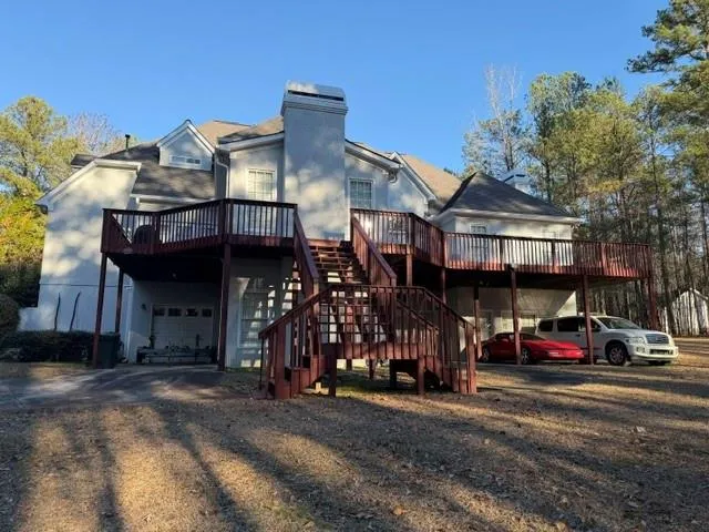 a view of a car park in front of a building