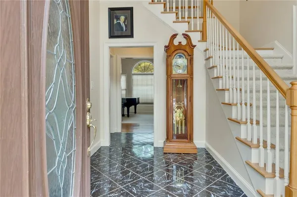a view of an entryway with a front door
