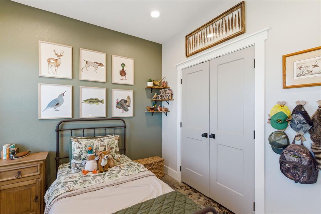 1734 Davis Road Lipan, TX 76462 - Photo 17 of 40 a bedroom with a bed and a window