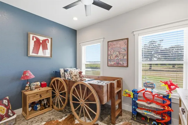 a bedroom with furniture and a bed