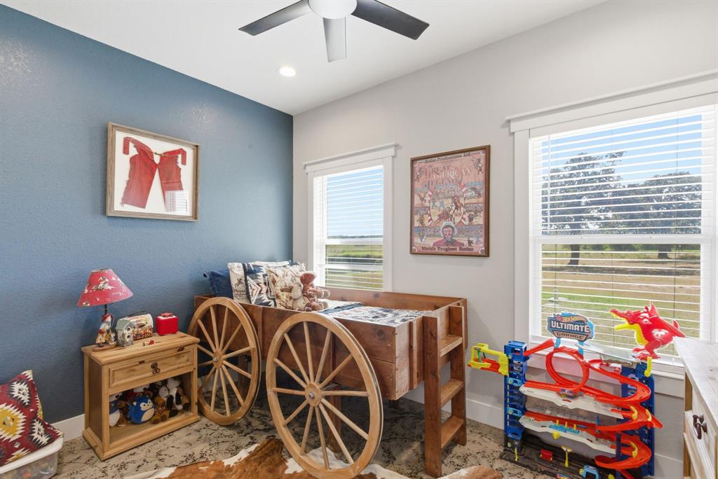 1734 Davis Road Lipan, TX 76462 - Photo 18 of 40 a bedroom with furniture and a bed