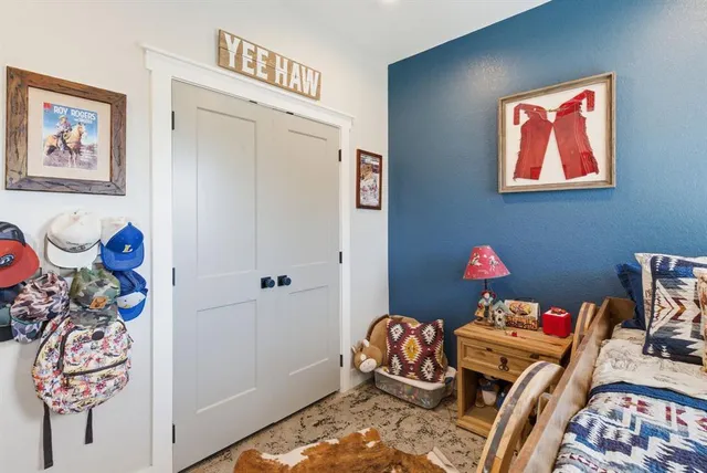 a room with toys and wooden floor