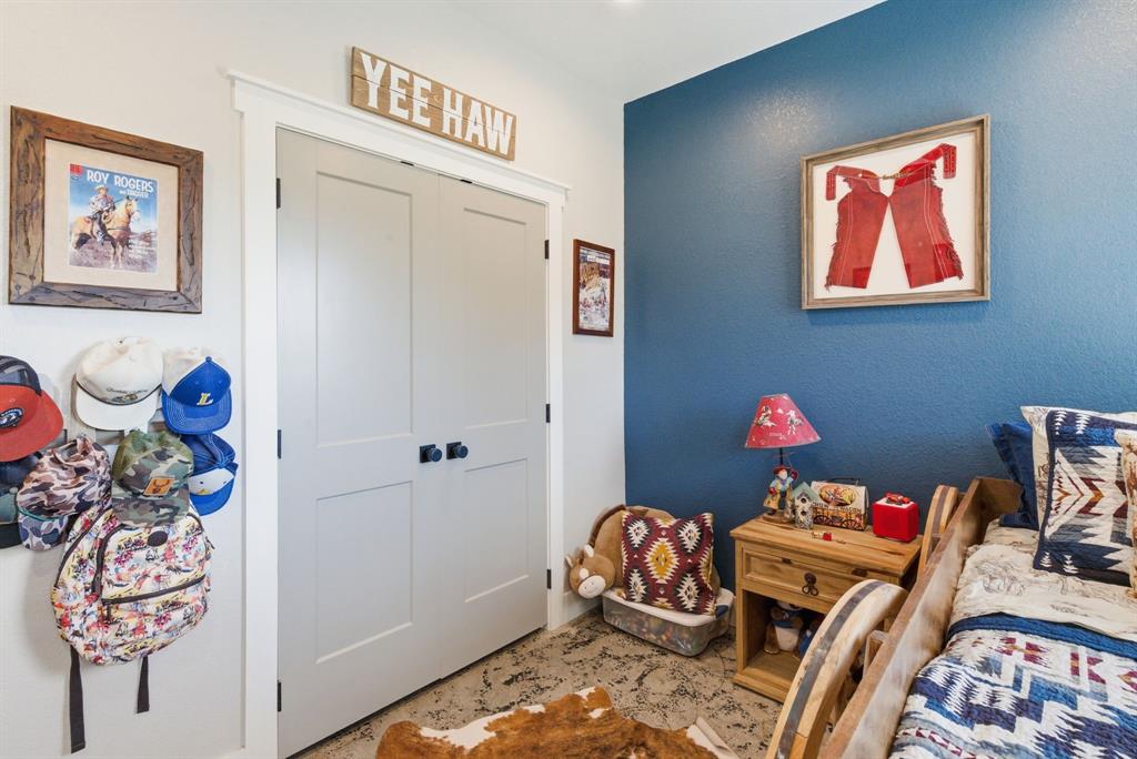 1734 Davis Road Lipan, TX 76462 - Photo 19 of 40 a room with toys and wooden floor