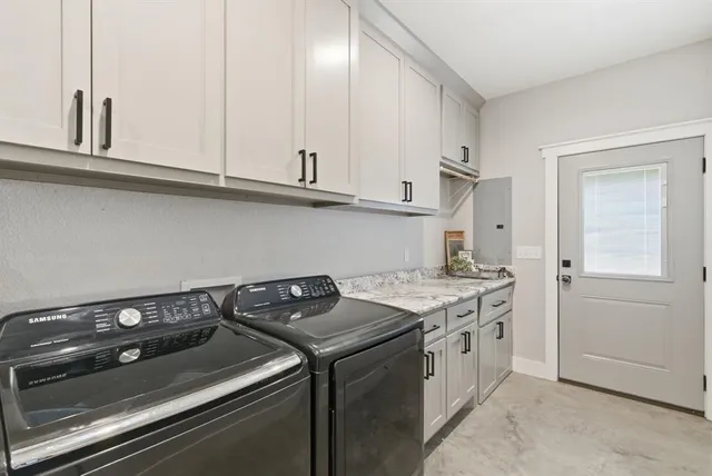 a kitchen with a stove and a refrigerator