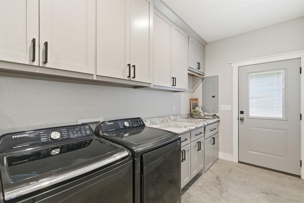 1734 Davis Road Lipan, TX 76462 - Photo 23 of 40 a kitchen with a stove and a refrigerator