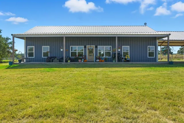 a view of a house with a swimming pool