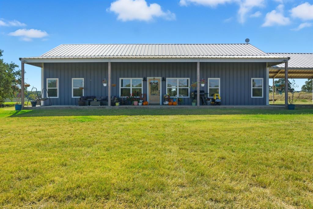 1734 Davis Road Lipan, TX 76462 - Photo 24 of 40 a view of a house with a swimming pool