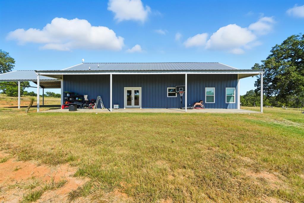 1734 Davis Road Lipan, TX 76462 - Photo 26 of 40 a view of a swimming pool with an outdoor seating