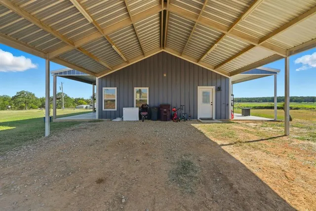 a view of a backyard of a house