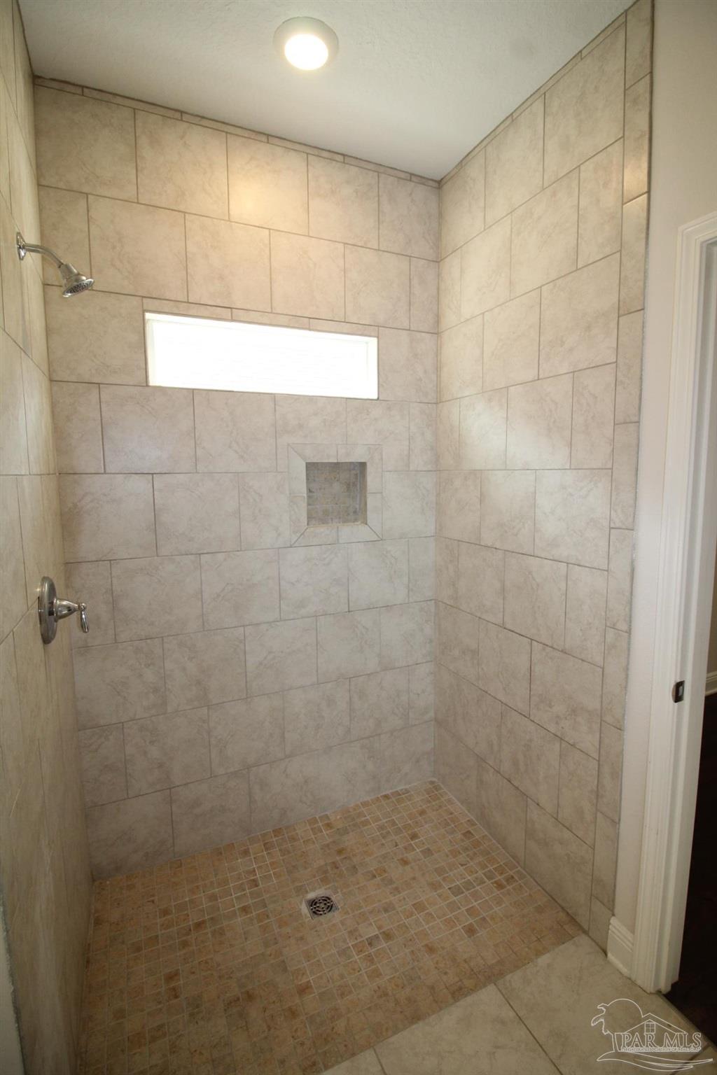 8006 Burnside Loop Pensacola, FL 32526 - Photo 15 of 22 a bathroom with a shower