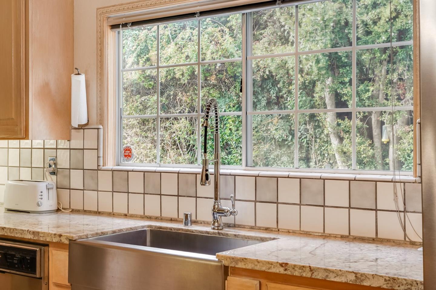 1383 Van Dusen Lane Campbell, CA 95008 - Photo 14 of 58 a view of a kitchen with a sink and large window