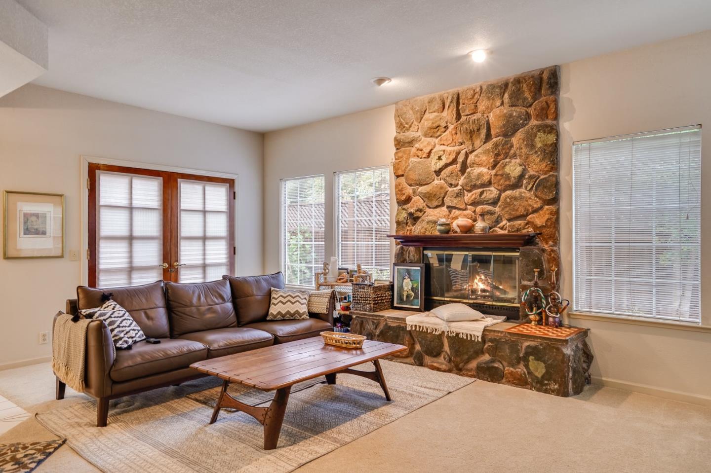1383 Van Dusen Lane Campbell, CA 95008 - Photo 19 of 58 a living room with furniture and a fireplace