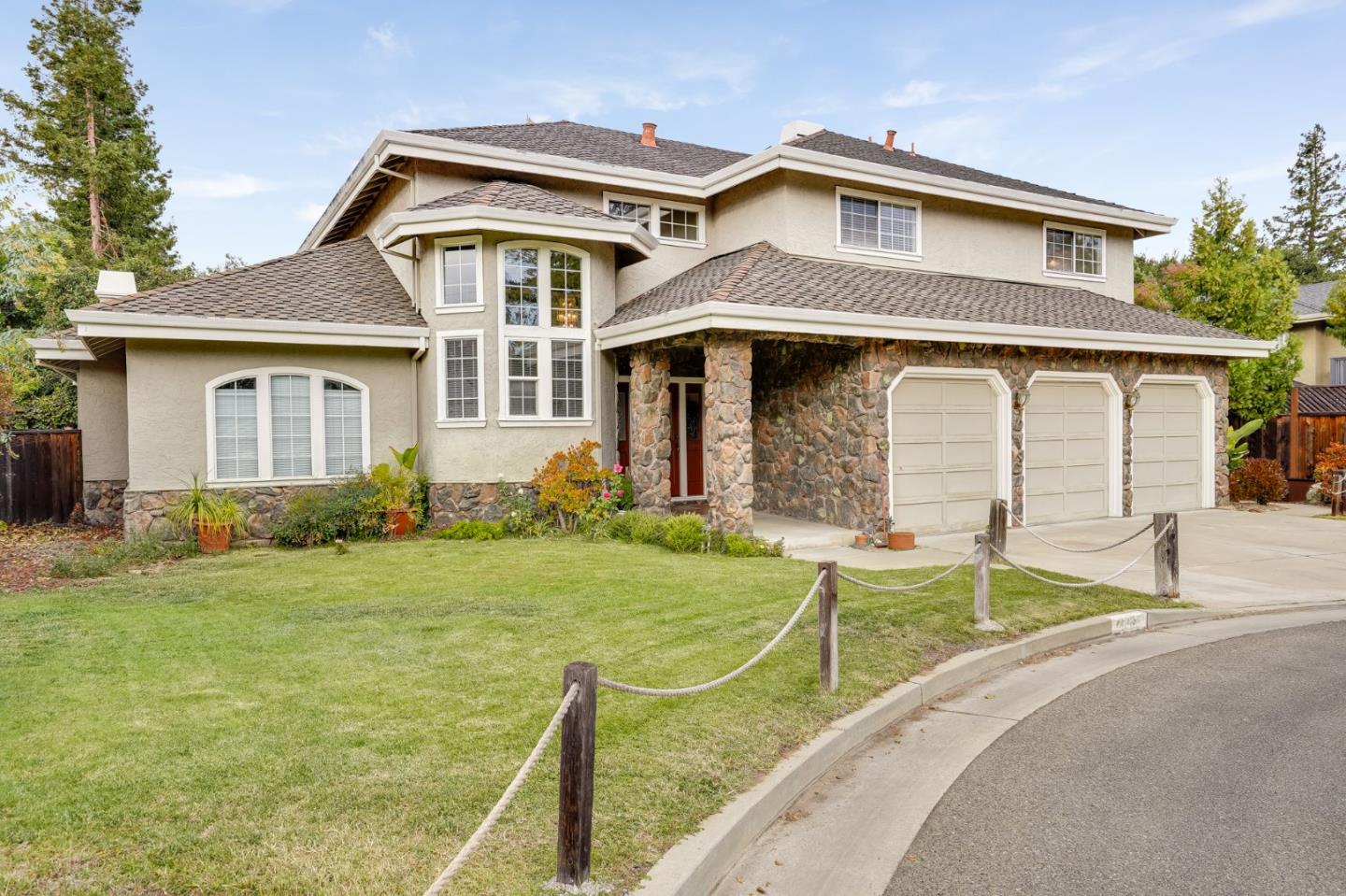 1383 Van Dusen Lane Campbell, CA 95008 - Photo 2 of 58 a front view of a house with a yard