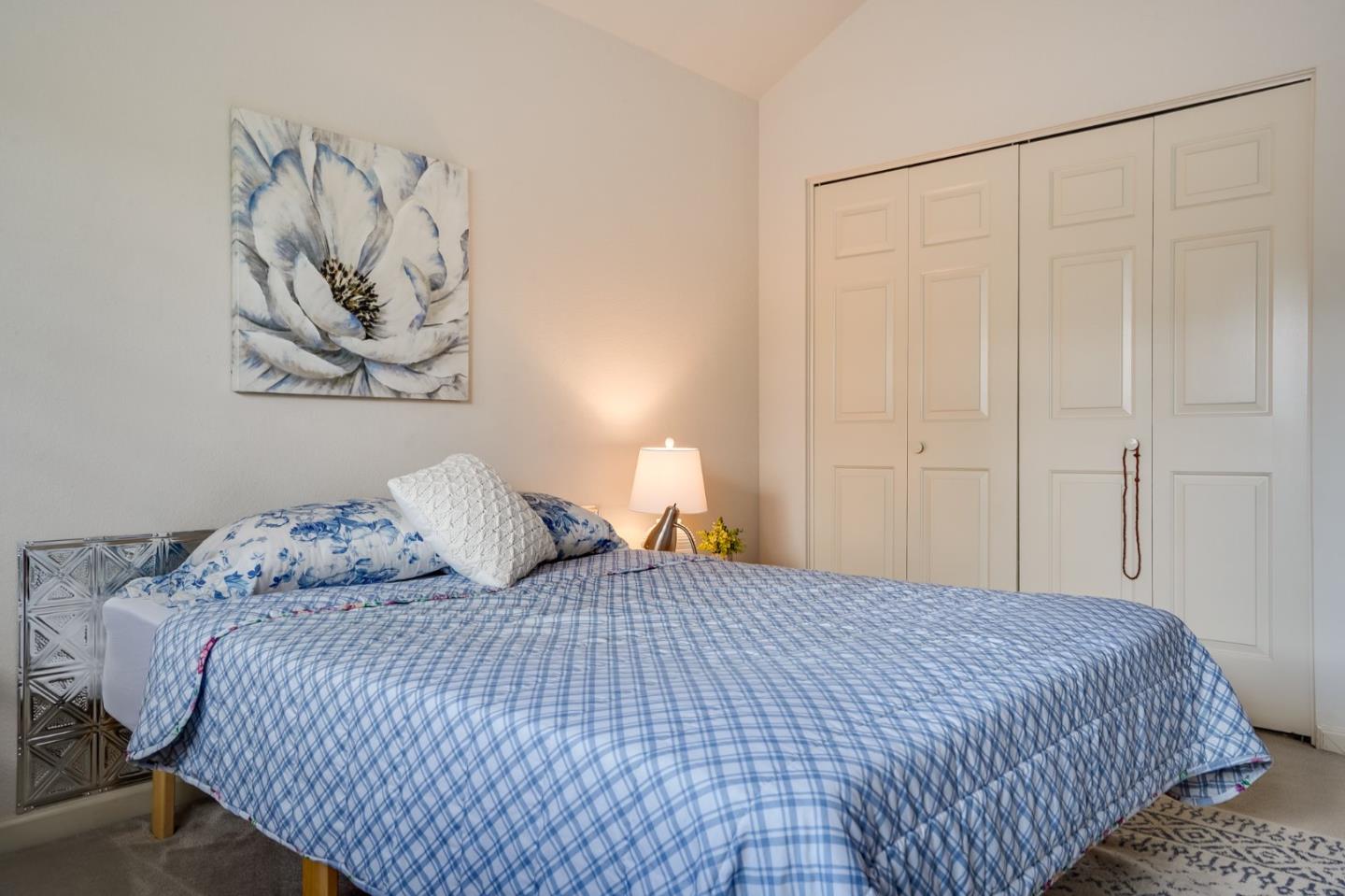 1383 Van Dusen Lane Campbell, CA 95008 - Photo 31 of 58 a bedroom with a bed and a window