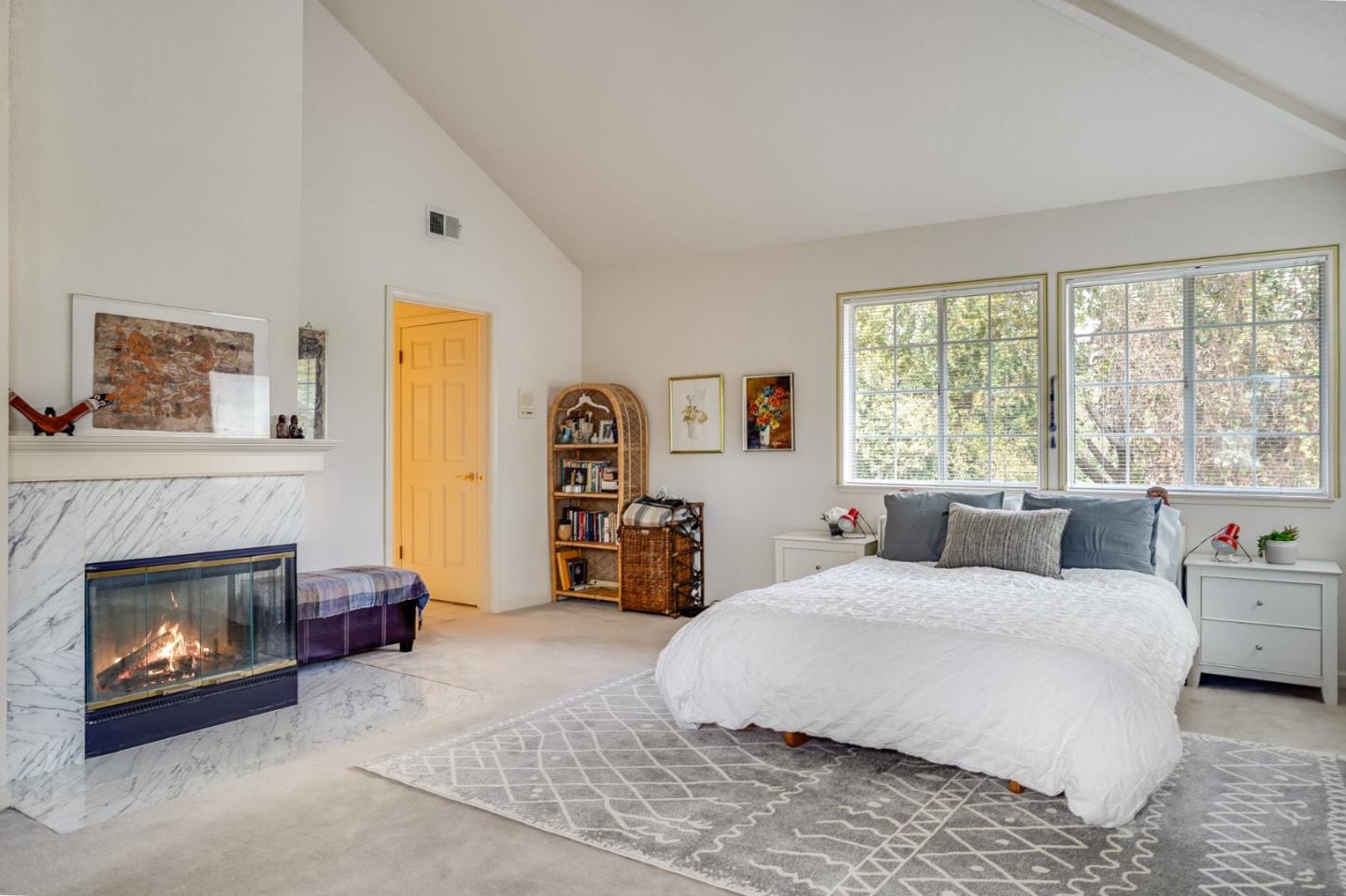 1383 Van Dusen Lane Campbell, CA 95008 - Photo 36 of 58 a bedroom with a bed and a fireplace