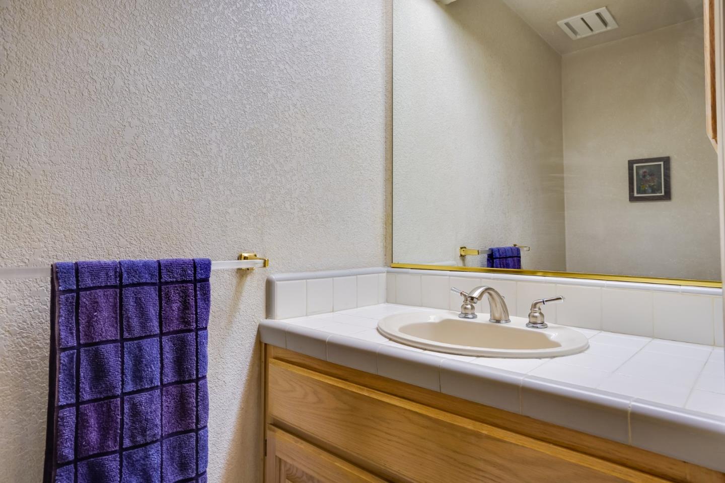 1383 Van Dusen Lane Campbell, CA 95008 - Photo 44 of 58 a bathroom with a sink and a mirror