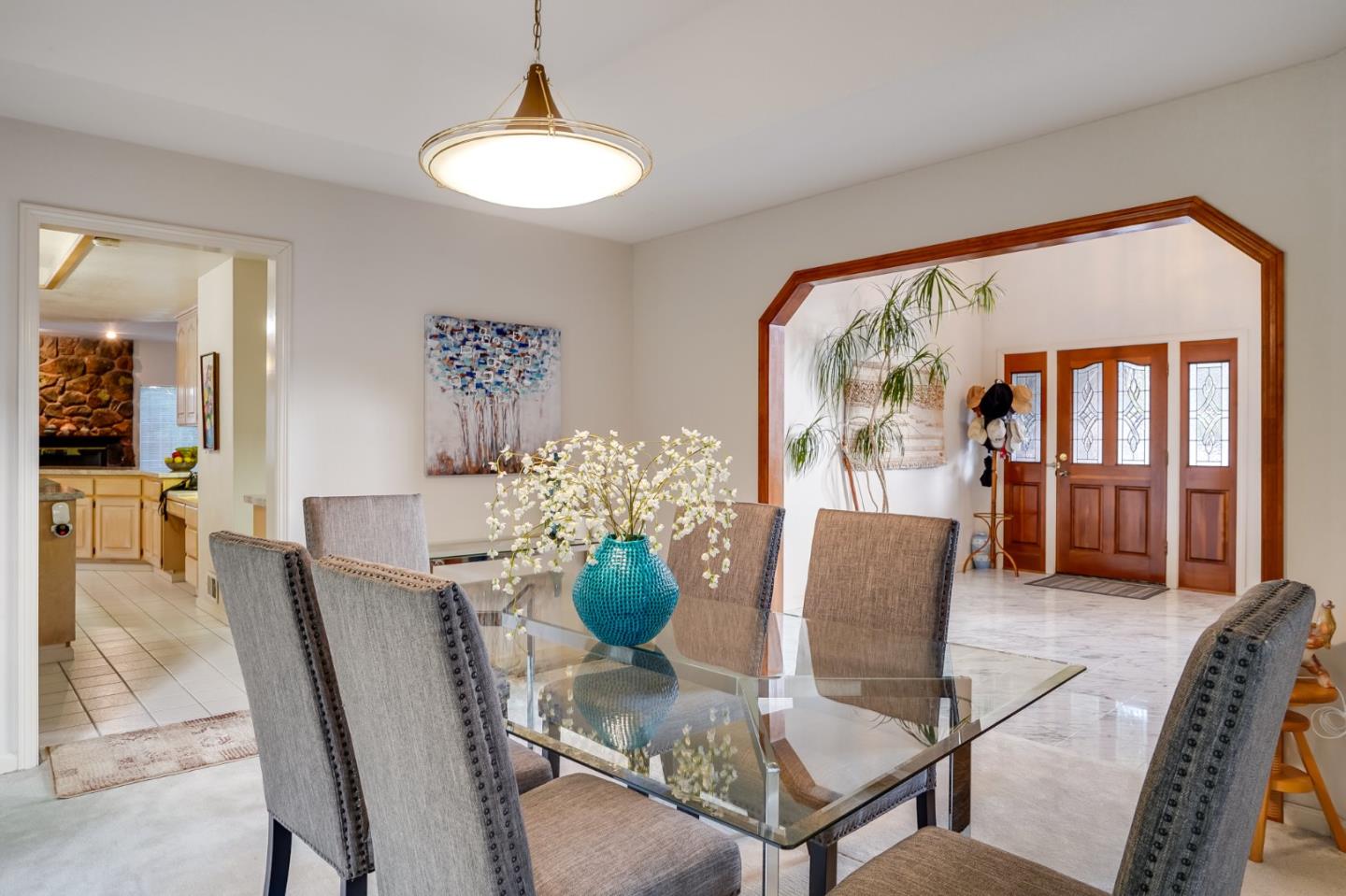 1383 Van Dusen Lane Campbell, CA 95008 - Photo 9 of 58 a dining room with furniture and a potted plant