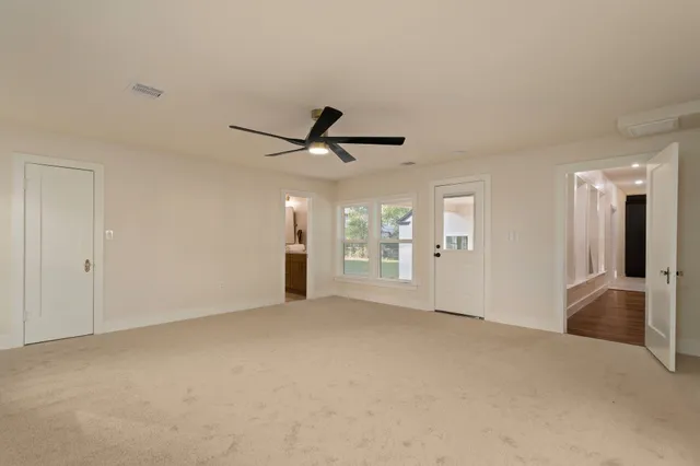 a bathroom with a sink and cabinets
