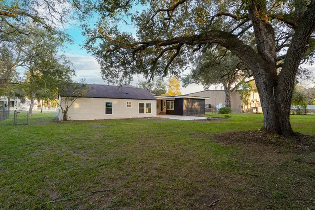a view of a house with a street