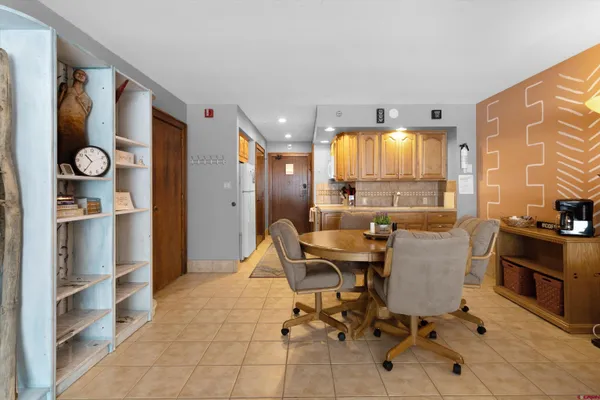 a view of a dining room with furniture