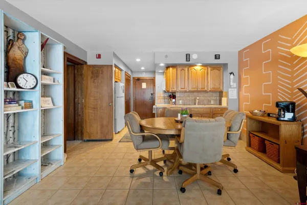 a view of a dining room with furniture window and outside view