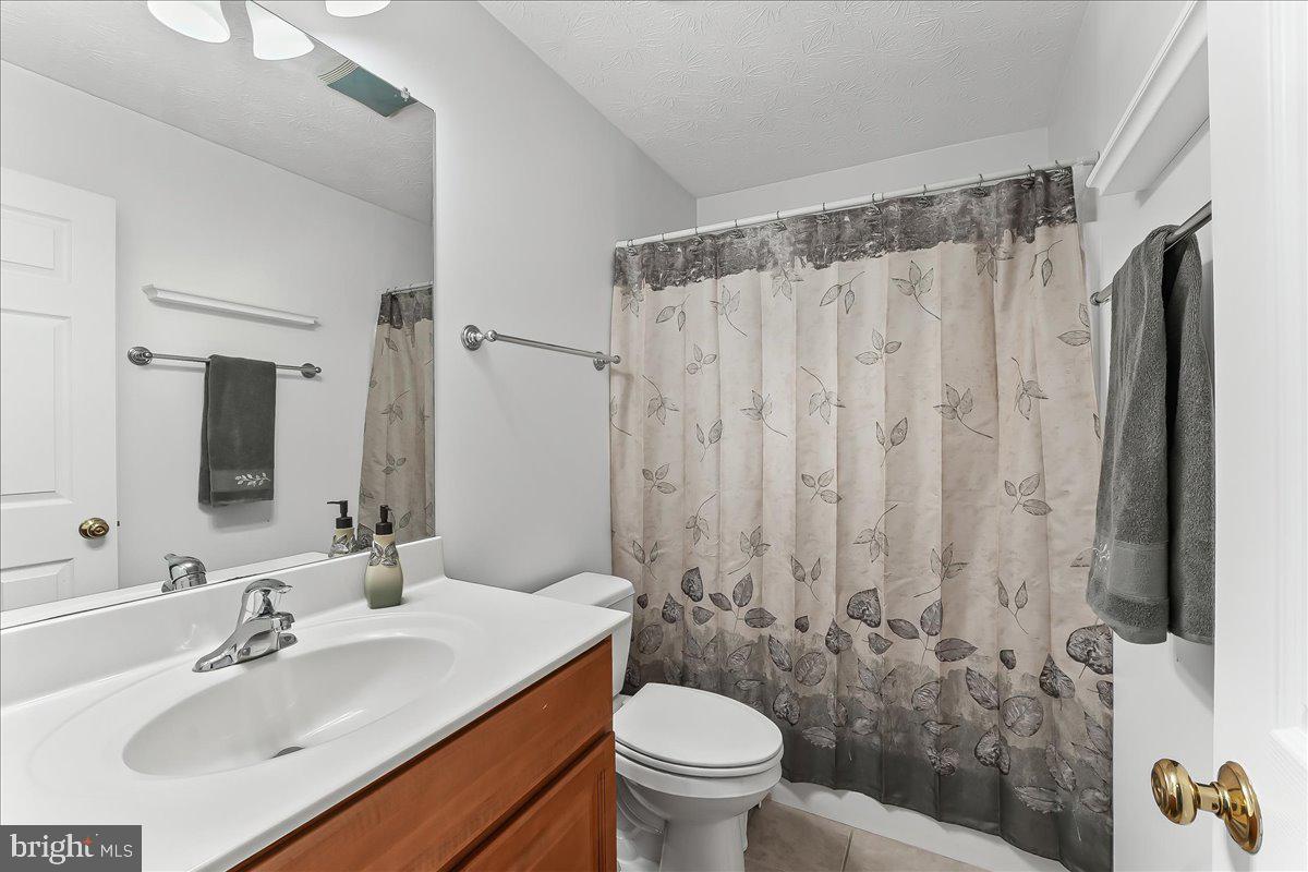 107 Britton Drive Rising Sun, MD 21911 - Photo 18 of 30 a bathroom with a sink toilet and shower