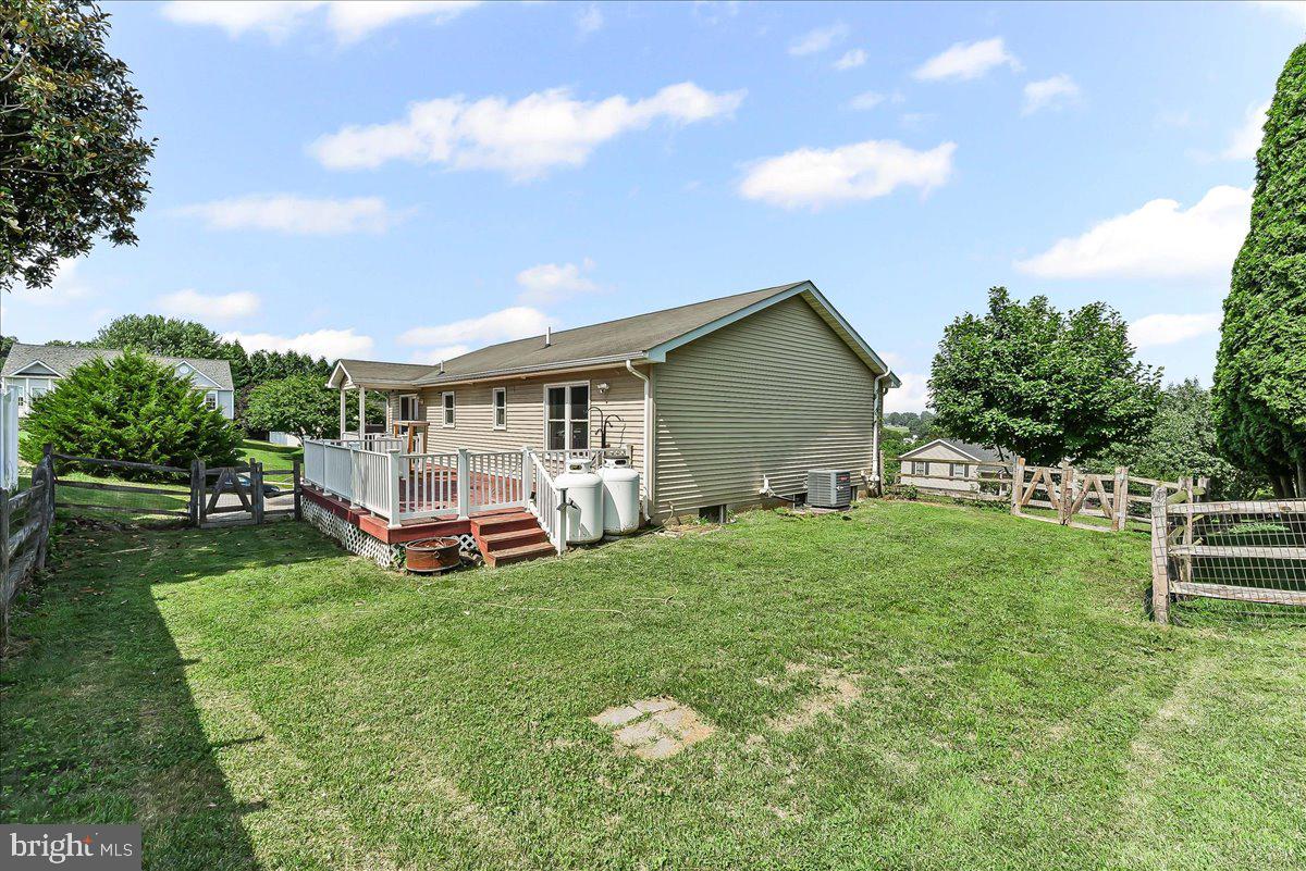 107 Britton Drive Rising Sun, MD 21911 - Photo 25 of 30 a view of a house with a yard porch and sitting area