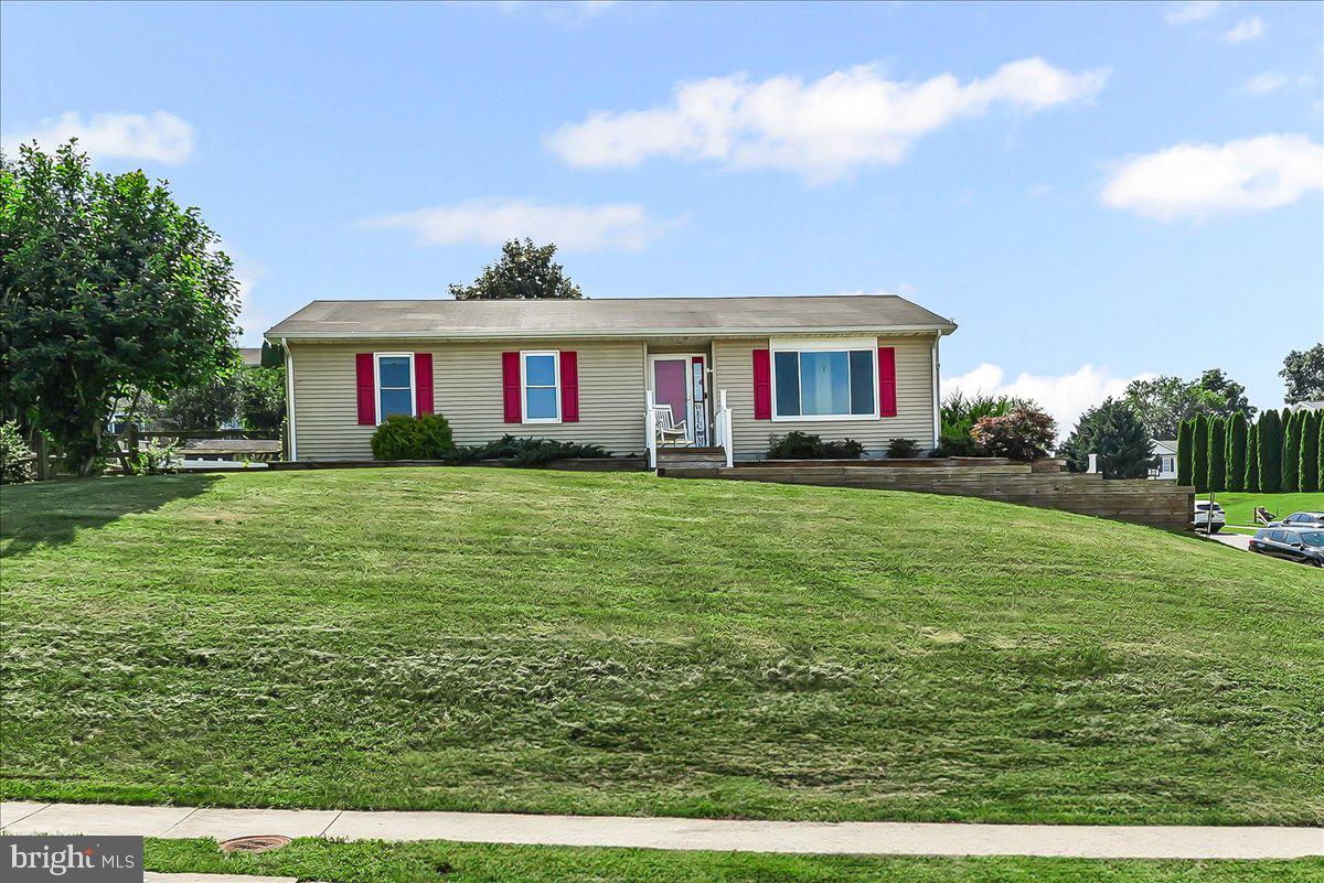 107 Britton Drive Rising Sun, MD 21911 - Photo 3 of 30 a front view of house with yard and green space