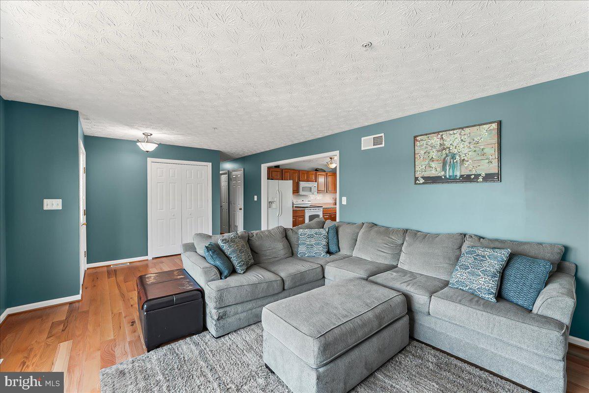 107 Britton Drive Rising Sun, MD 21911 - Photo 10 of 30 a living room with furniture and a couch