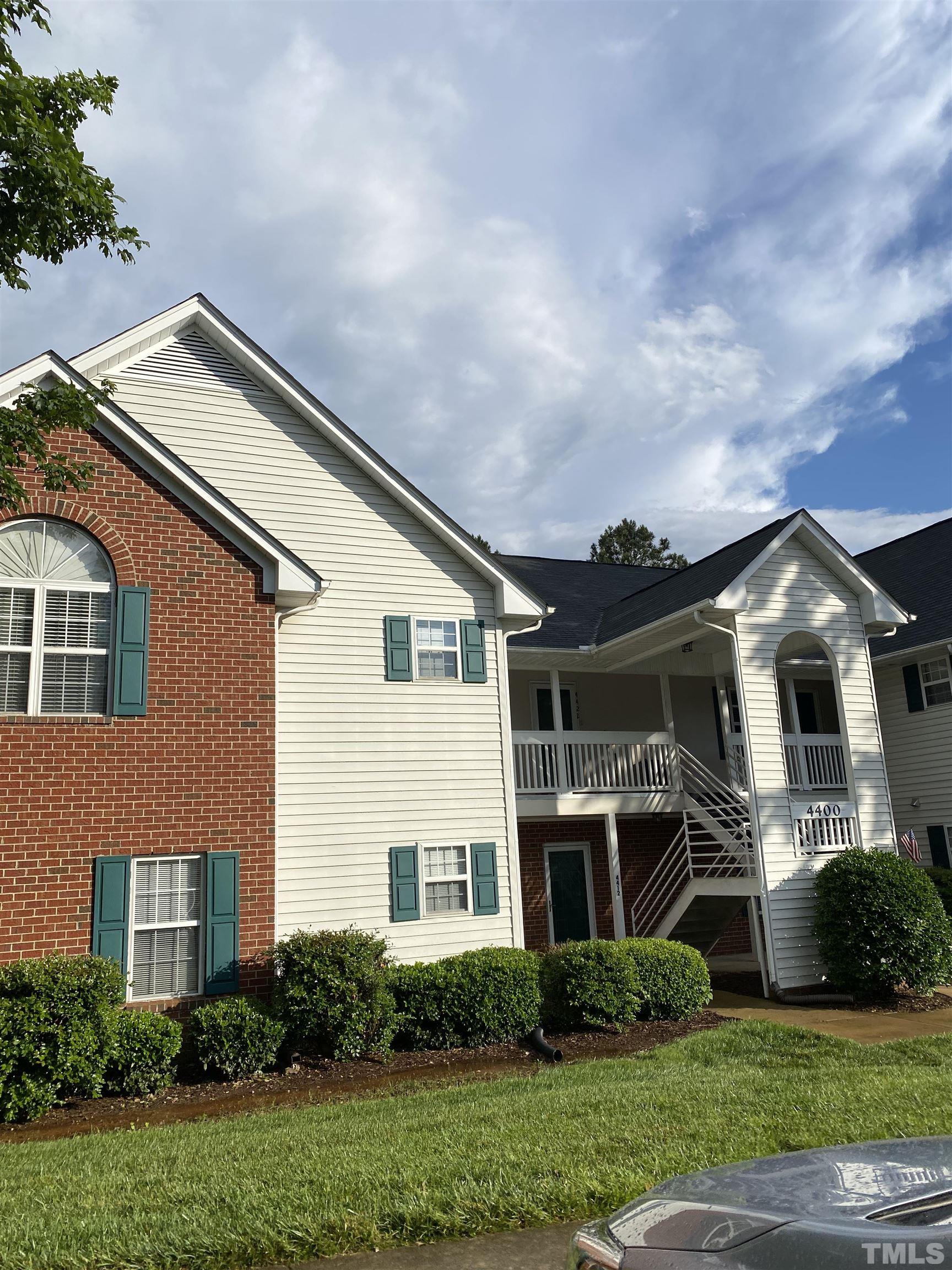 4422 Wellington Ridge Loop, Unit 4422 Cary, NC 27518 - Photo 2 of 40 a front view of a house with a yard