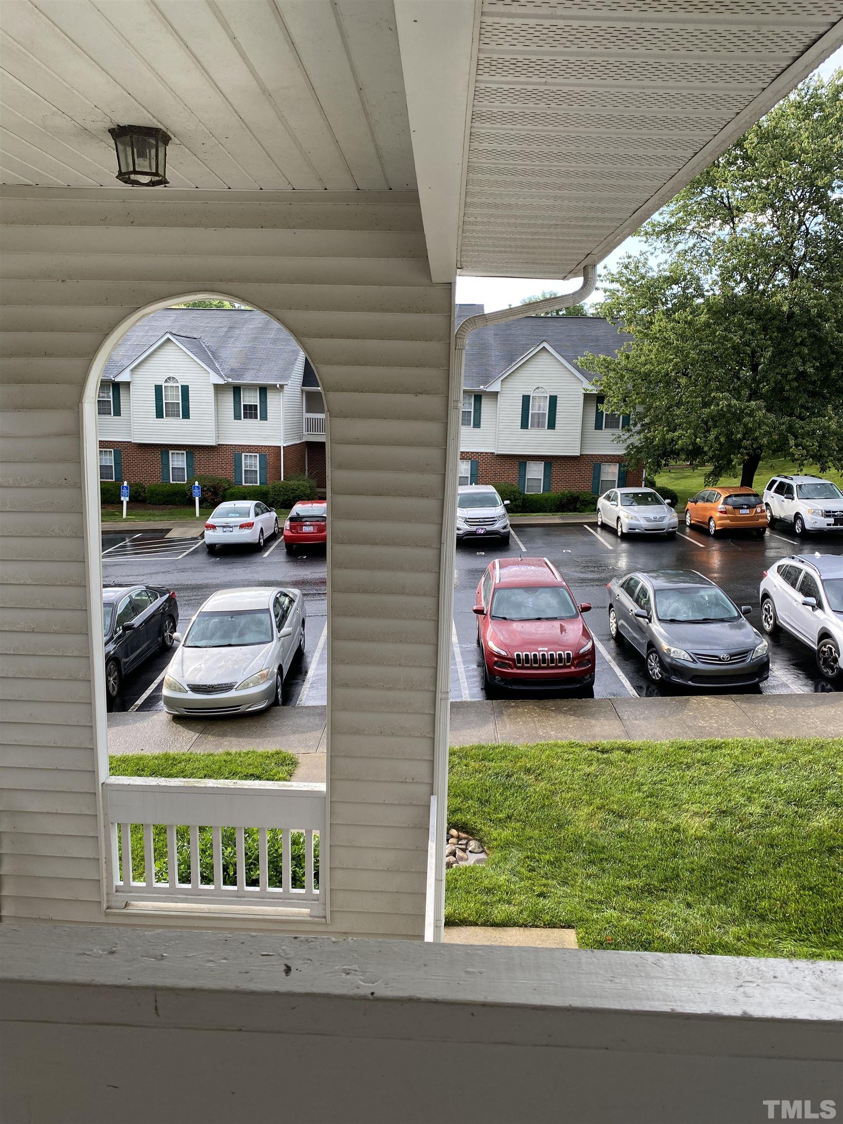 4422 Wellington Ridge Loop, Unit 4422 Cary, NC 27518 - Photo 36 of 40 a view of house with backyard outdoor seating and entertaining space