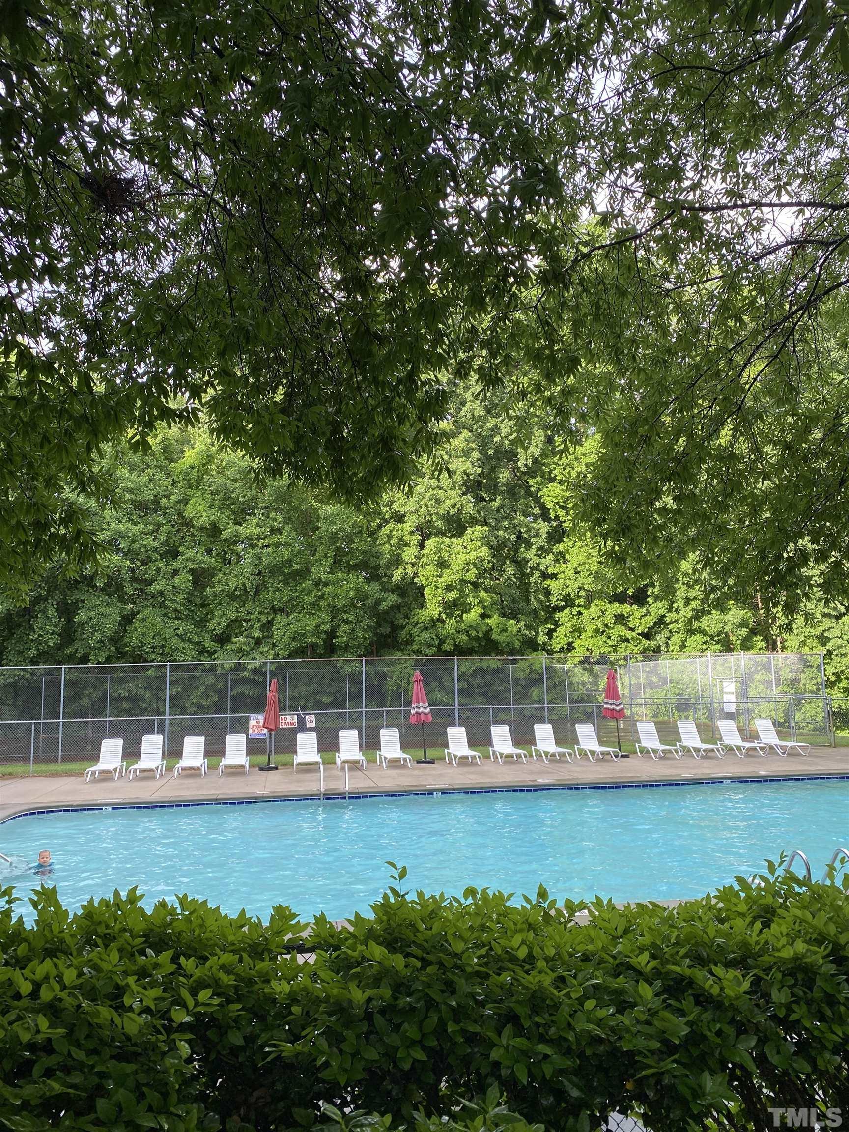 4422 Wellington Ridge Loop, Unit 4422 Cary, NC 27518 - Photo 39 of 40 a view of house with a yard and sitting area