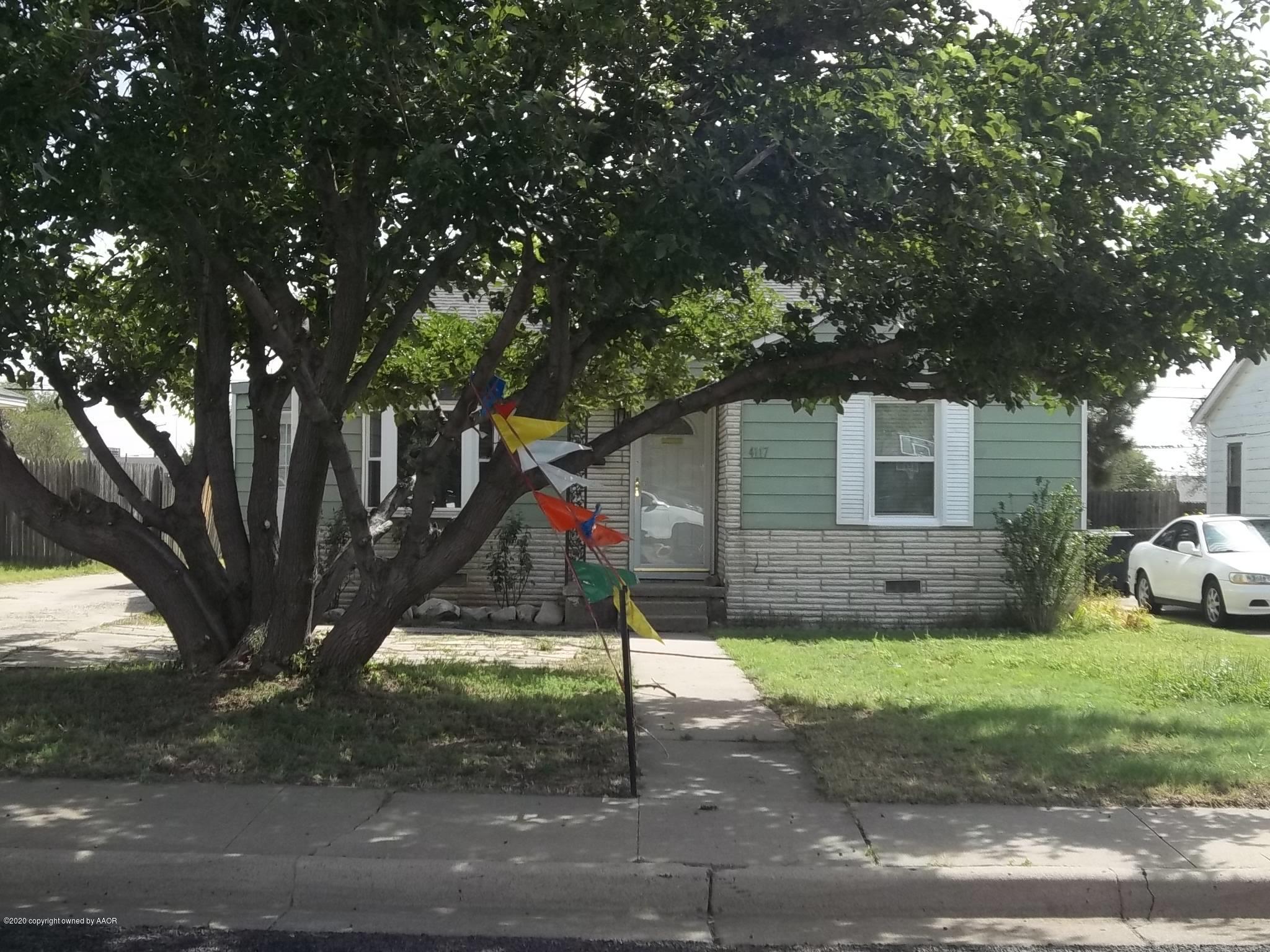 4117 South Tyler Street Amarillo, TX 79110 - Photo 1 of 18 a view of a house with a backyard