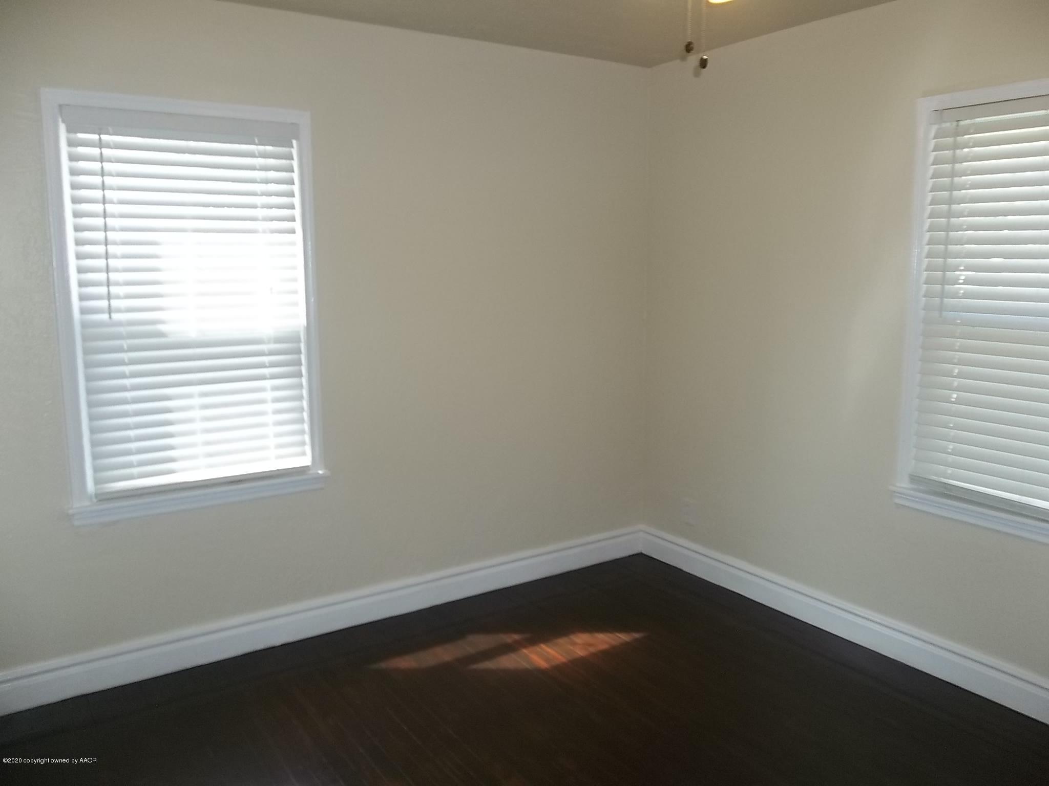 4117 South Tyler Street Amarillo, TX 79110 - Photo 11 of 18 an empty room with a window