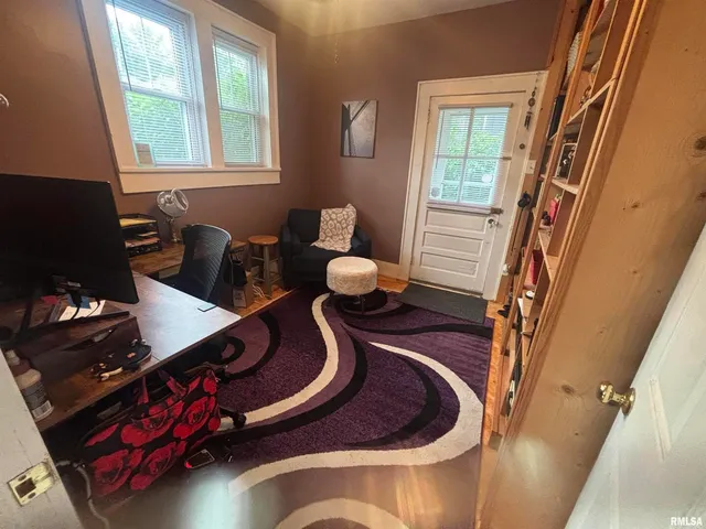 a room with furniture and a window