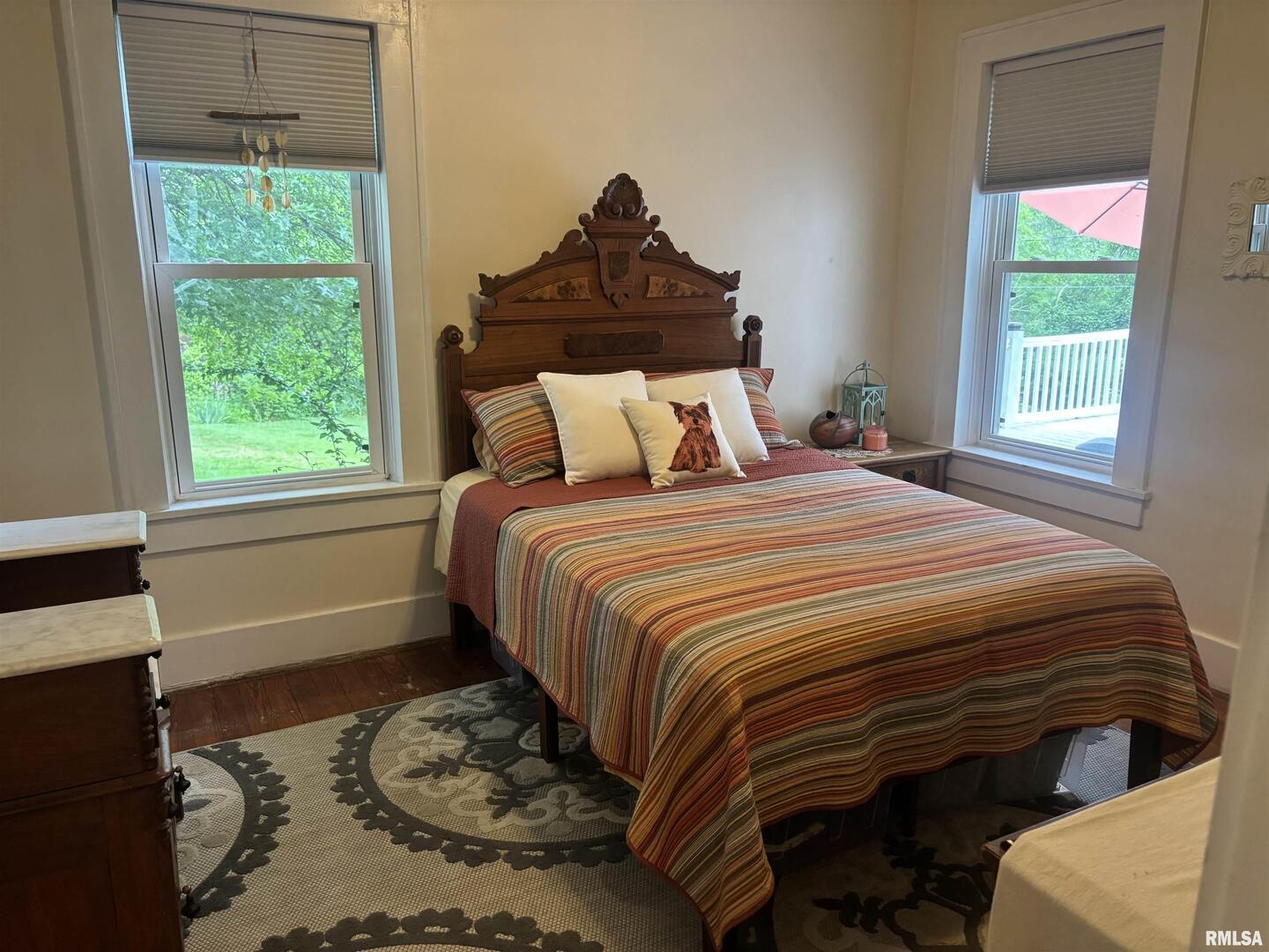 680 Stratton Street Chester, IL 62233 - Photo 14 of 22 a bedroom with a bed and a window