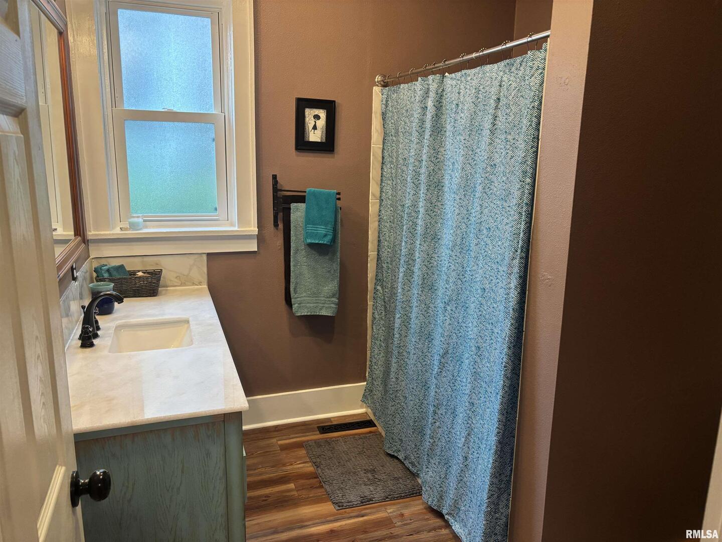 680 Stratton Street Chester, IL 62233 - Photo 15 of 22 a bathroom with a sink and a mirror