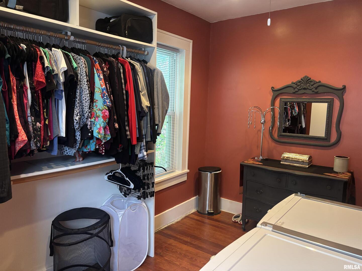 680 Stratton Street Chester, IL 62233 - Photo 17 of 22 a view of walk in closet with clothes and shoes