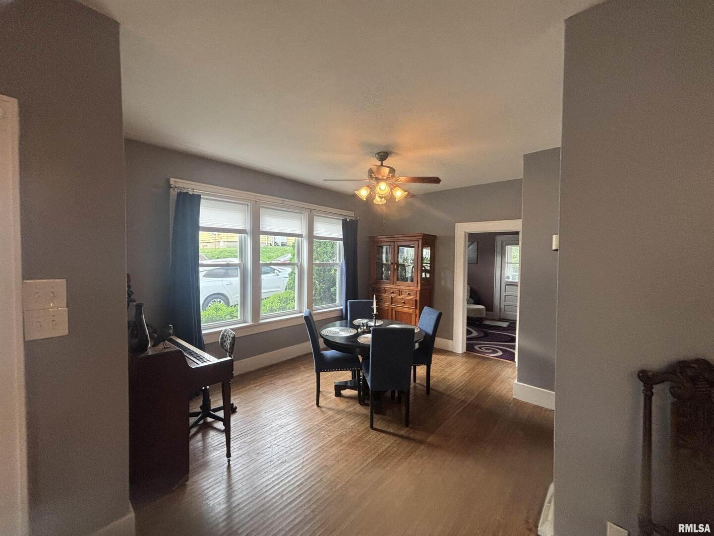 680 Stratton Street Chester, IL 62233 - Photo 9 of 22 a view of a livingroom with furniture window and wooden floor