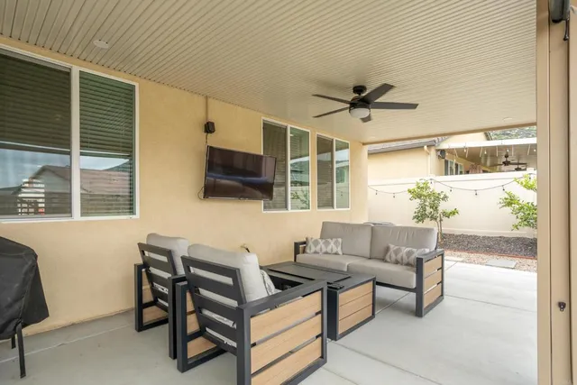 a bathroom with a double vanity sink toilet and a mirror