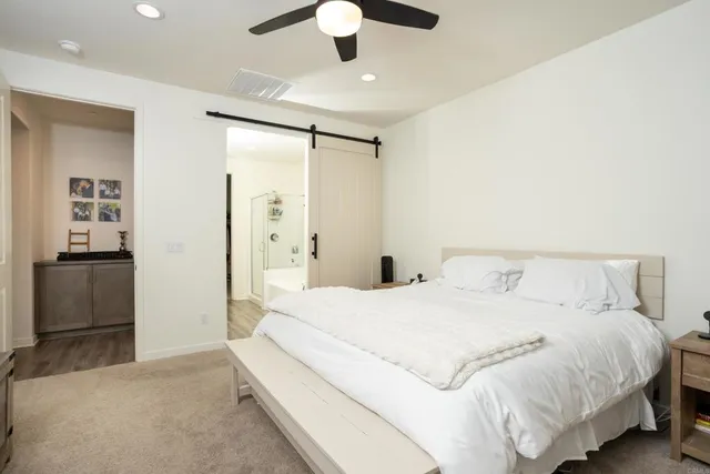a view of a livingroom with furniture and a window