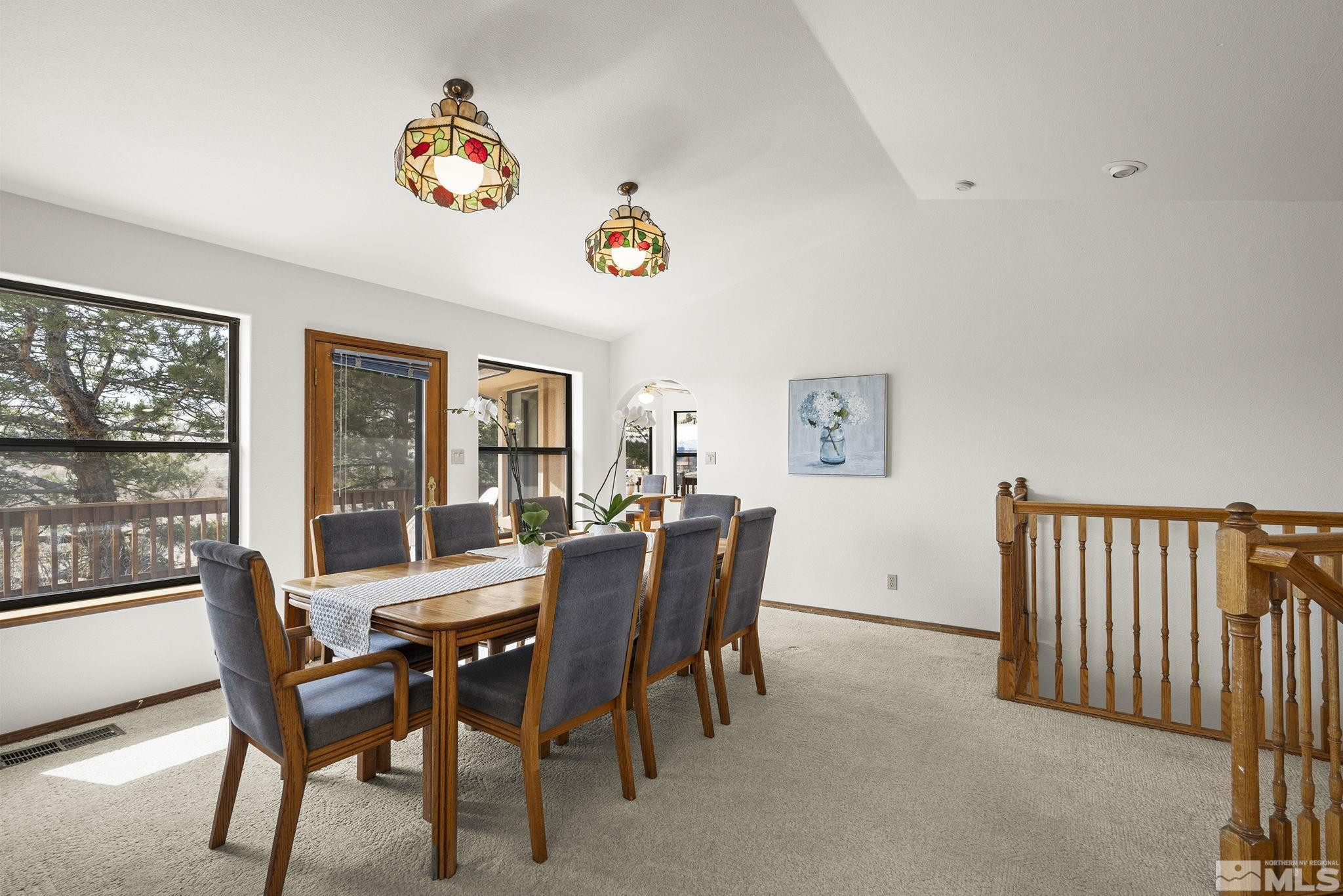 80 Cassas Court Reno, NV 89511 - Photo 11 of 40 a view of a dining room with furniture window and outside view