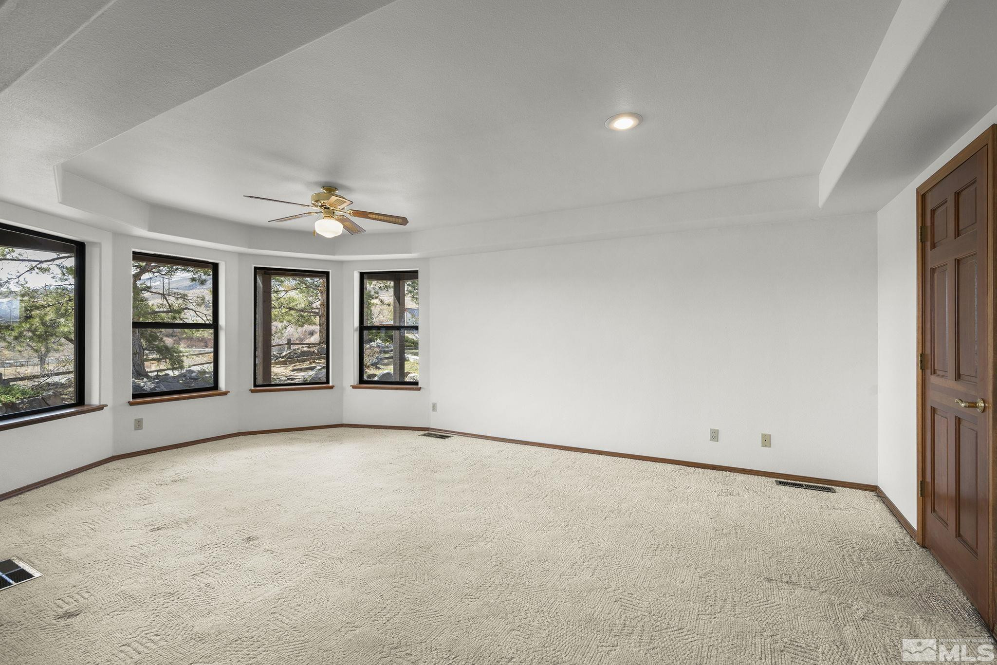 80 Cassas Court Reno, NV 89511 - Photo 26 of 40 an empty room with windows
