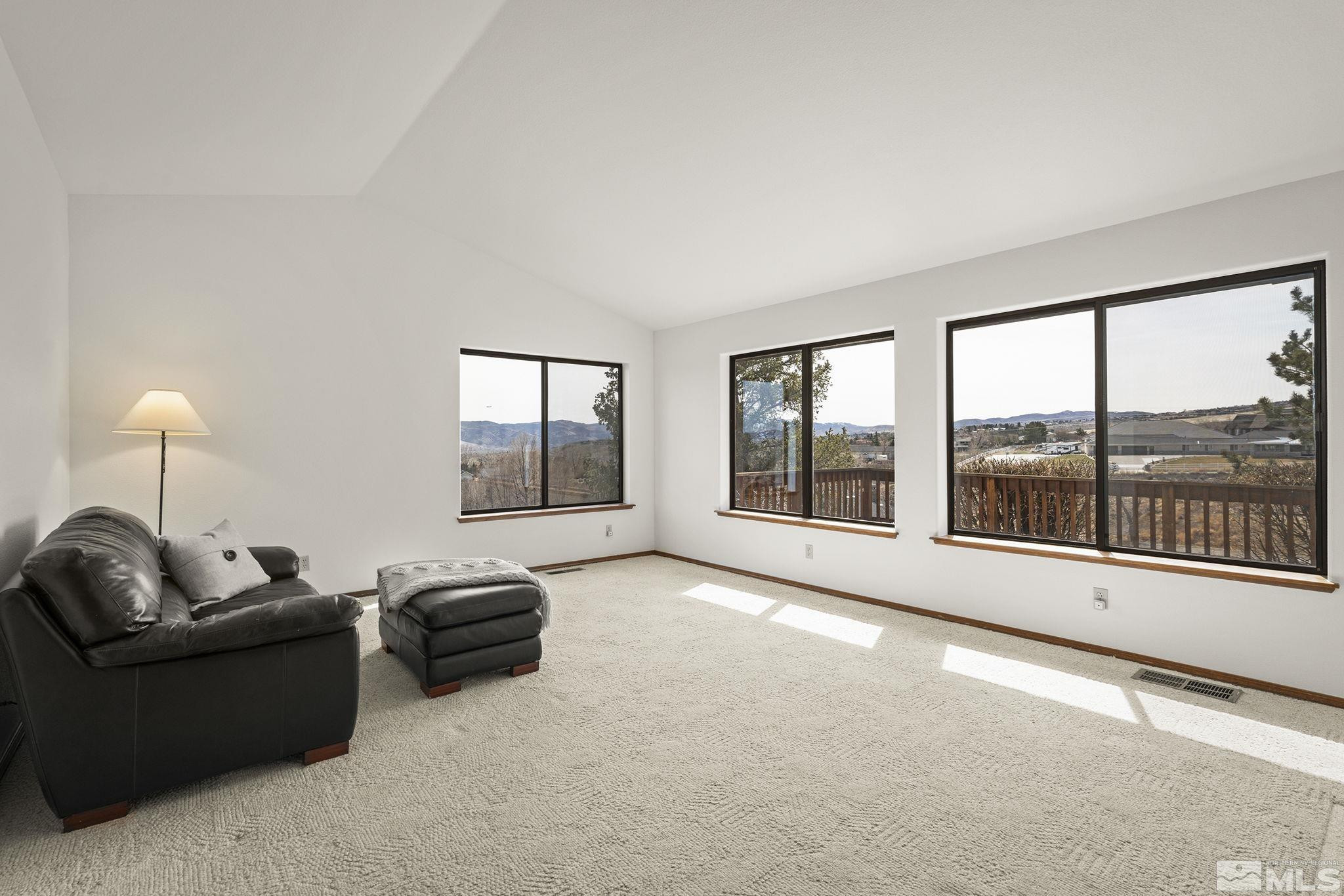 80 Cassas Court Reno, NV 89511 - Photo 8 of 40 a living room with furniture and a large window