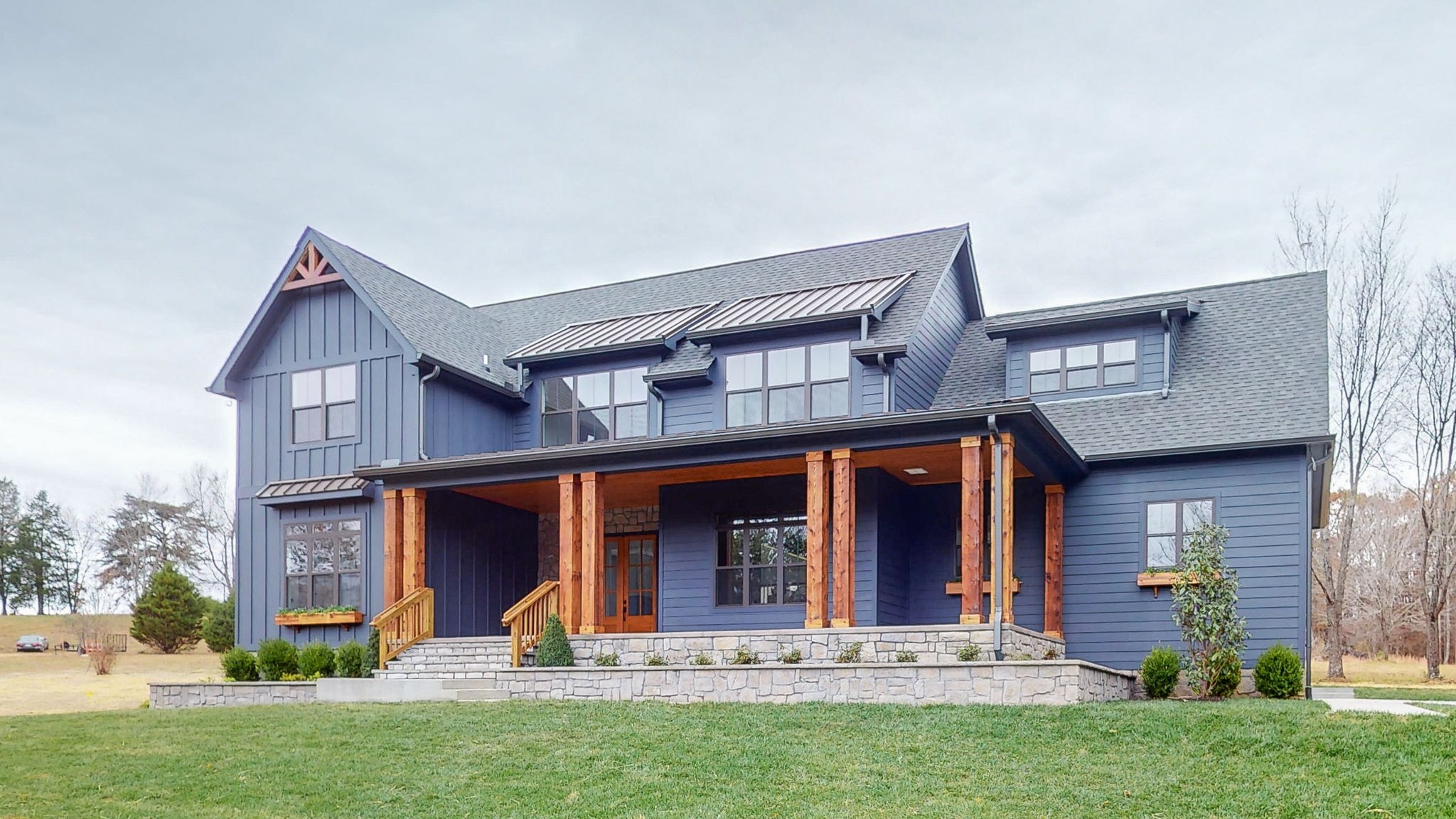 front view of a house with a yard