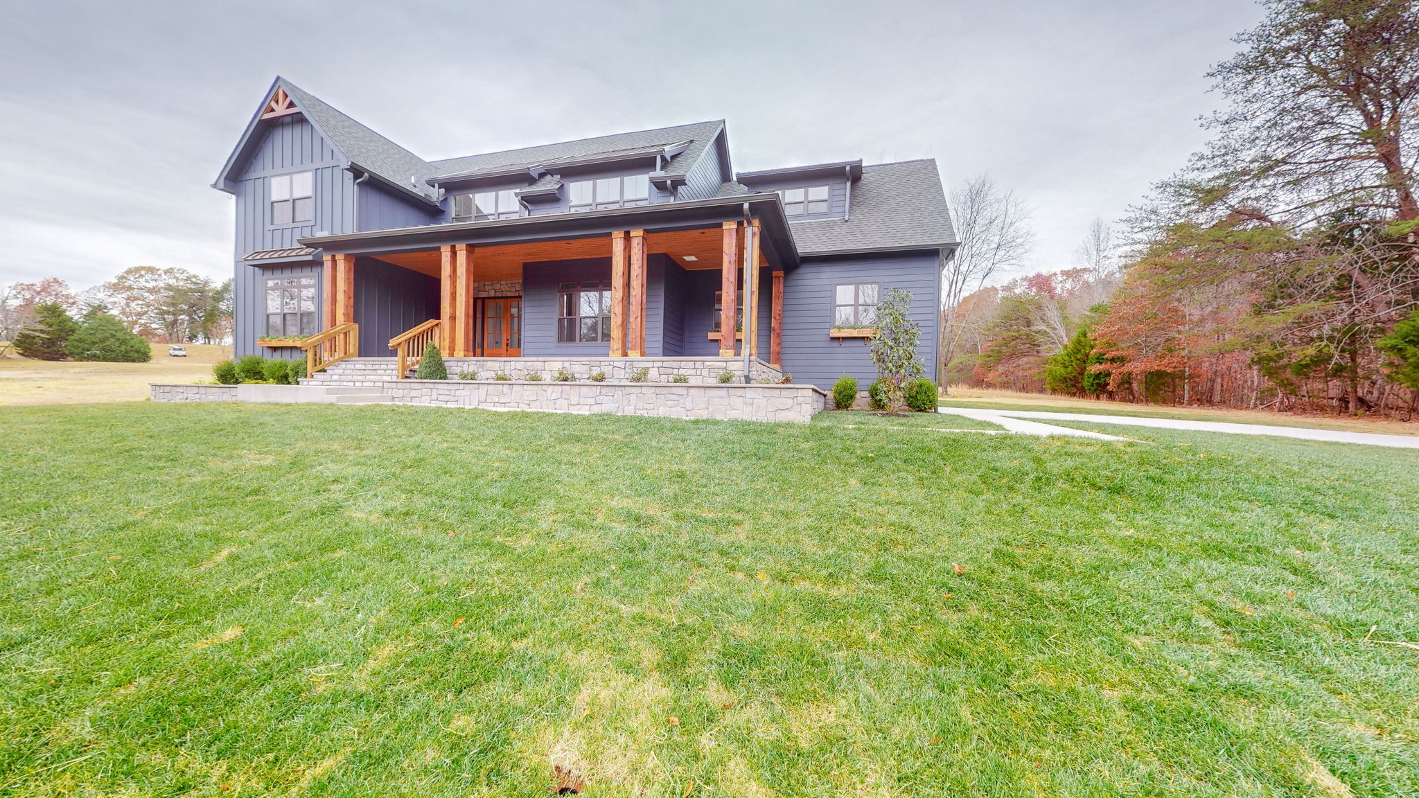 1636 Deal Road Burns, TN 37029 - Photo 2 of 10 a front view of a house with a yard