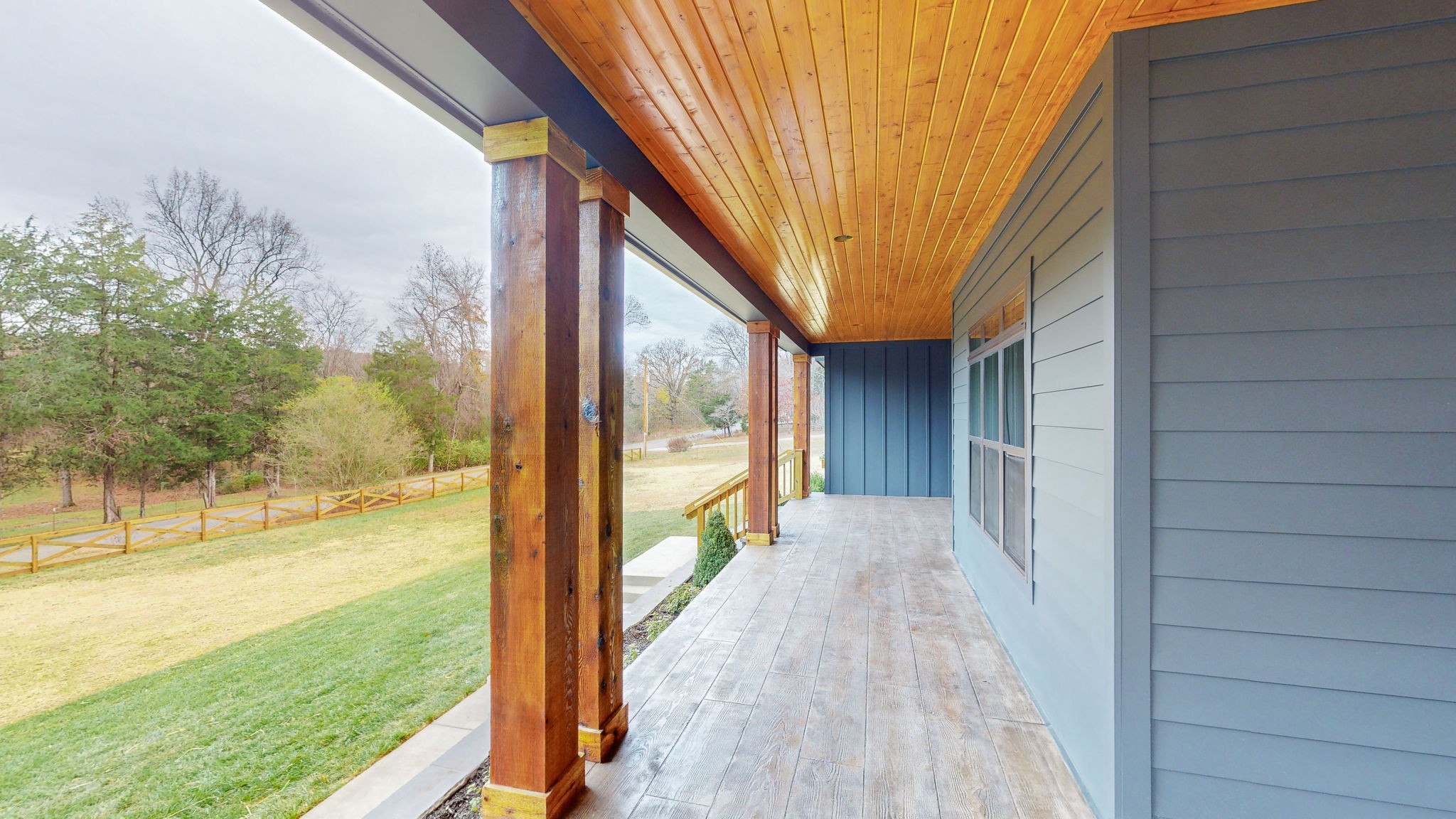 1636 Deal Road Burns, TN 37029 - Photo 3 of 10 a view of a room with wooden floor and floor to ceiling window with yard