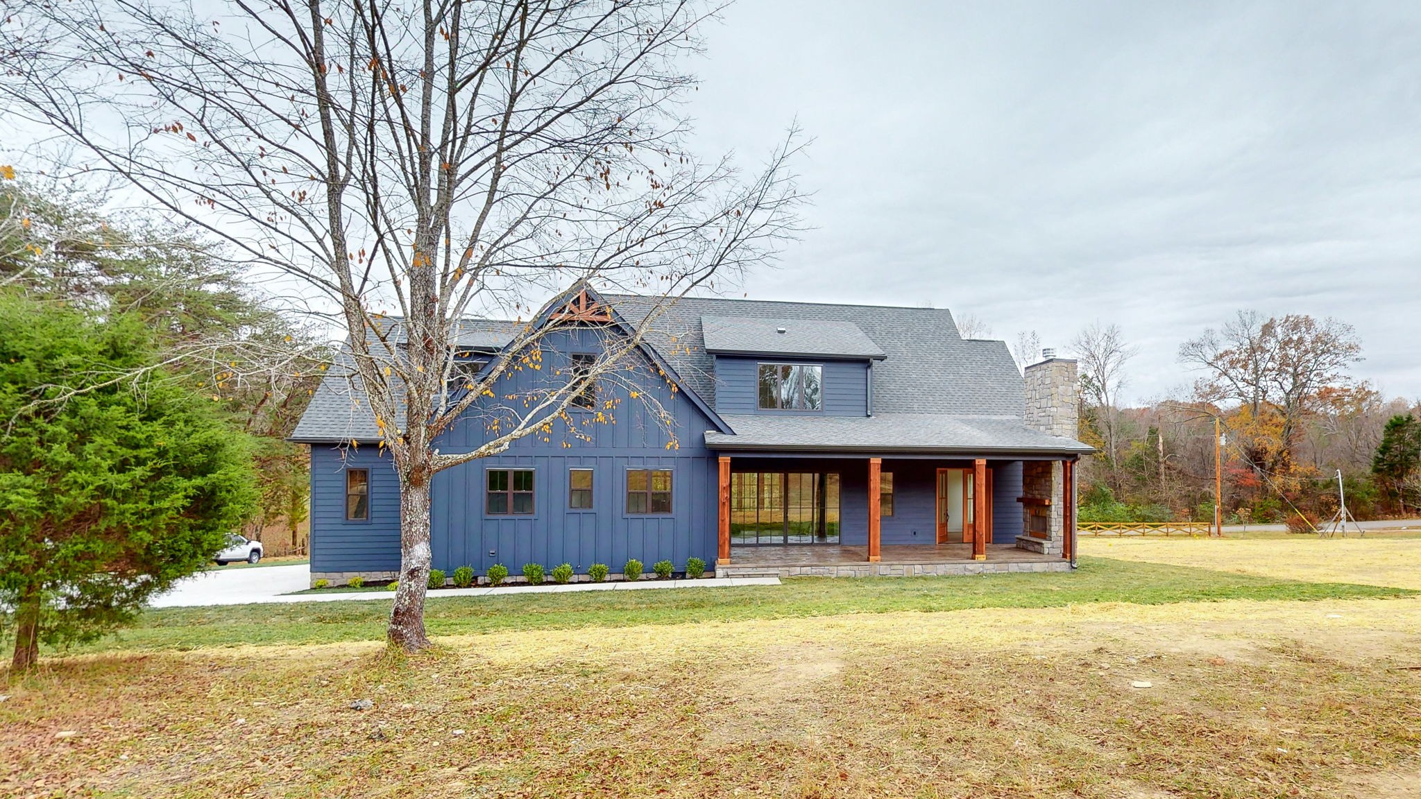 1636 Deal Road Burns, TN 37029 - Photo 6 of 10 a front view of a house with a yard