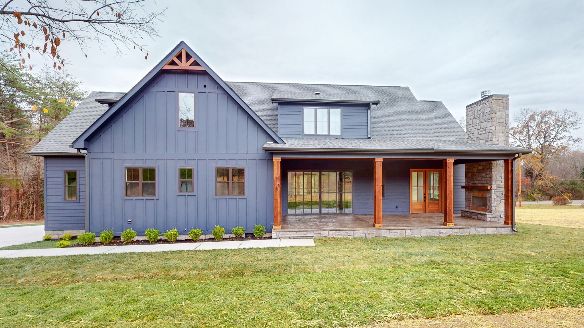 1636 Deal Road Burns, TN 37029 - Photo 7 of 10 a front view of a house with garden