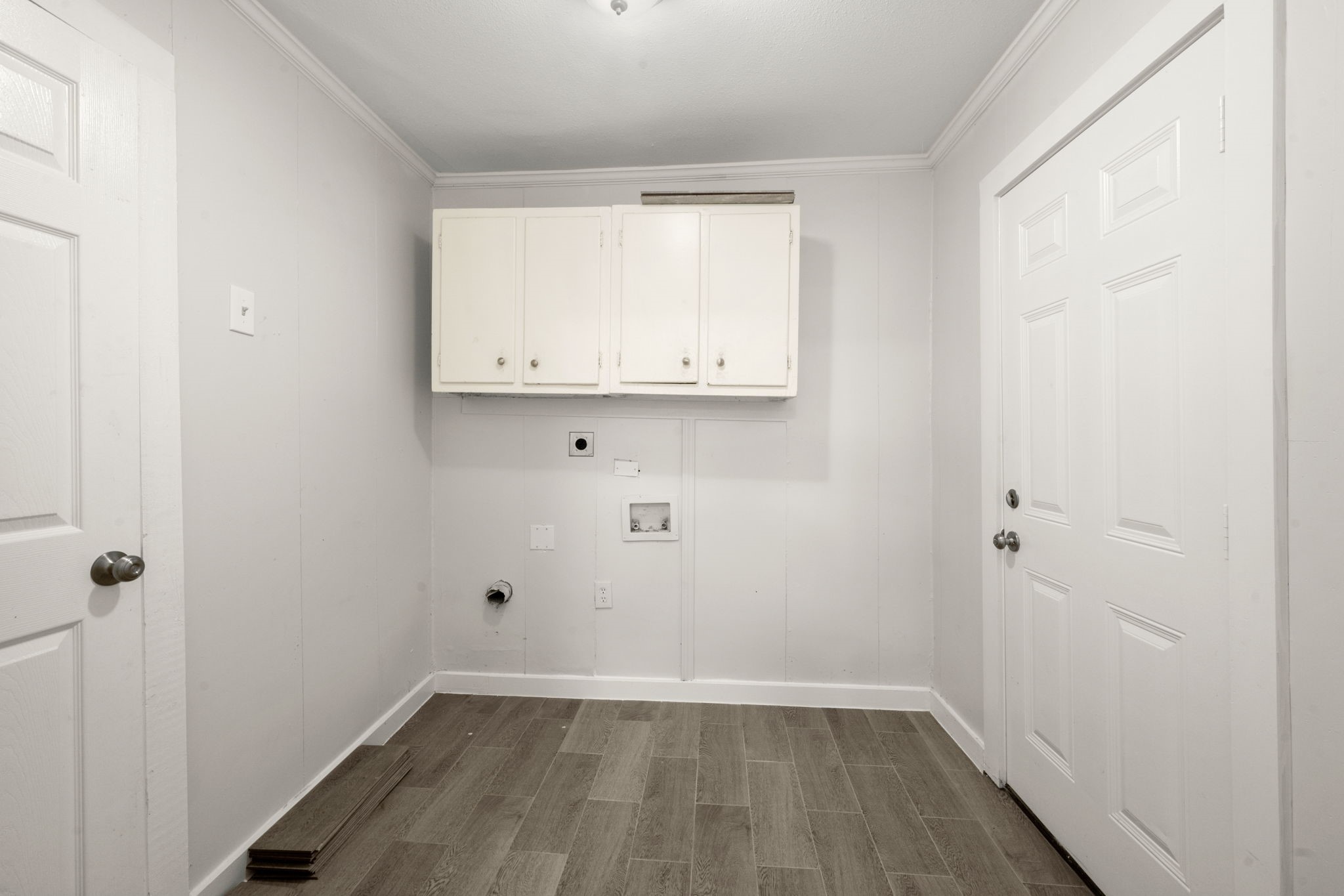 5219 Myrtlewood Street Houston, TX 77033 - Photo 19 of 36 a view of a small space with wooden floor and a window